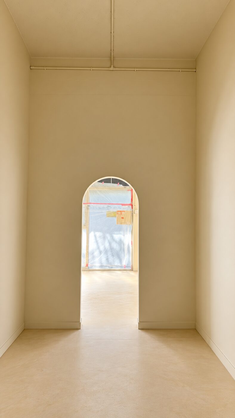 Arched doorway in a freshly plastered and painted hallway, No.1 Plastering and Painting